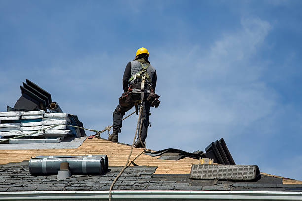 Professional Roofing technician working in Grandview, IA